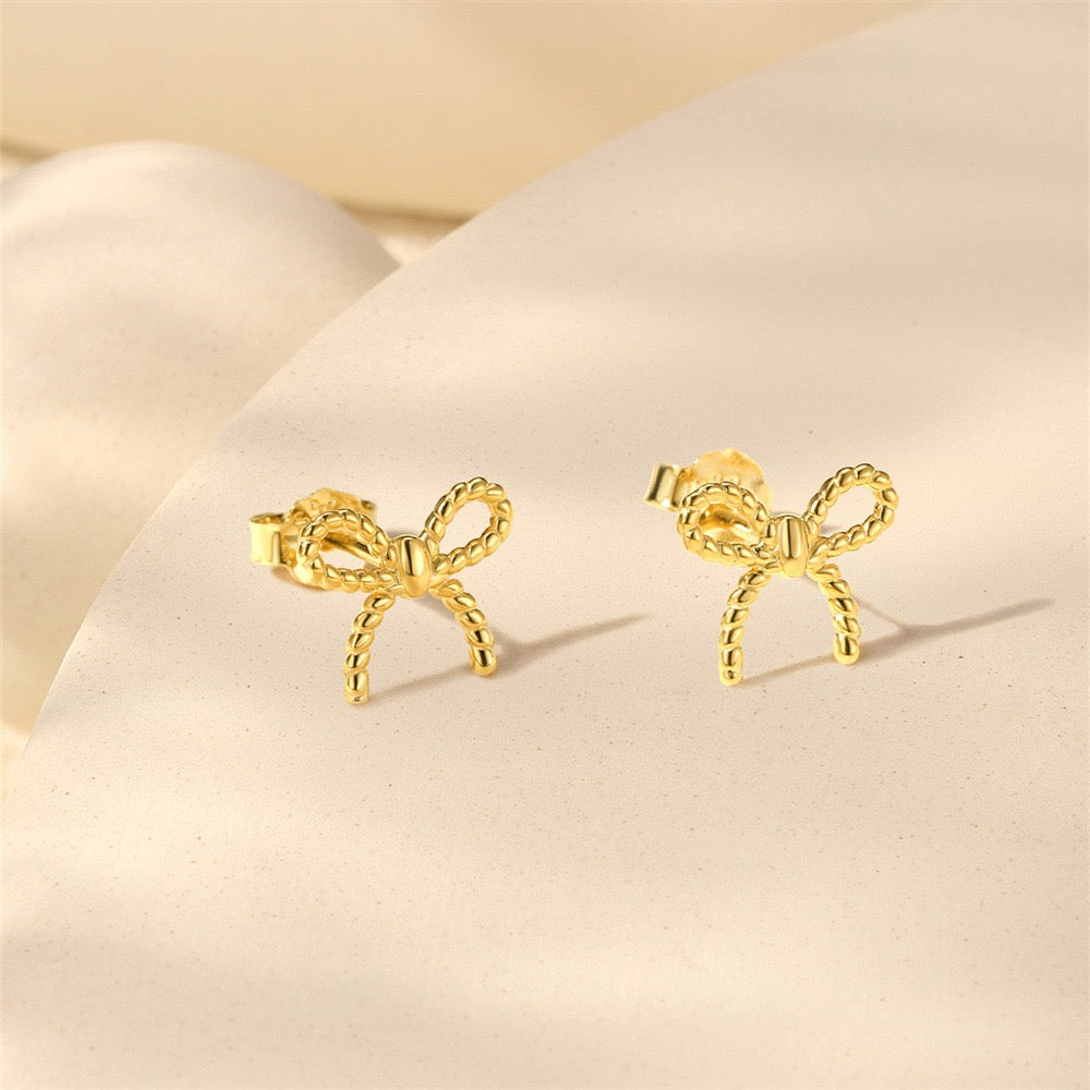 BOW EAR STUDS GOLD